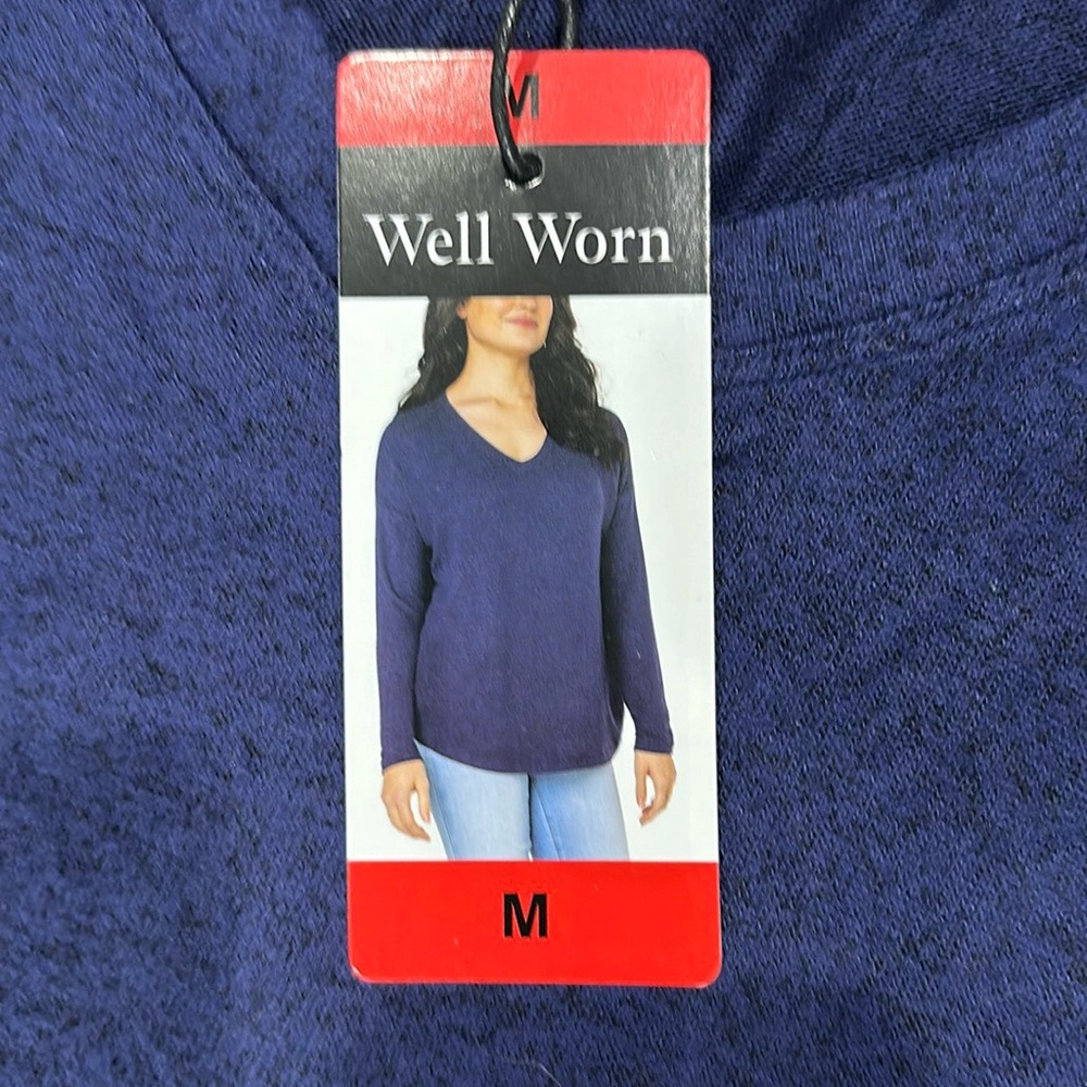 Ladies size M- brand :Well worn. Never worn with tag!
